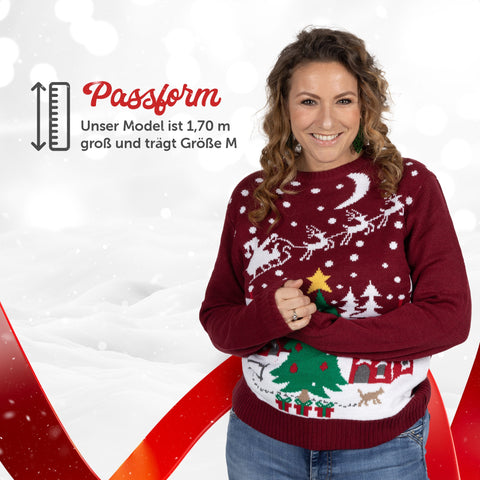 Passform Damen: Weihnachtspullover Gemütliche Weihnachtslandschaft, unser Model ist 1,70 m groß und trägt Größe M