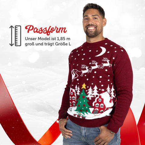 Passform Herren: Weihnachtspullover Gemütliche Weihnachtslandschaft, unser Model ist 1,85 m groß und trägt Größe L