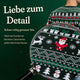 Der Perfekte Weihnachtspullover im Detail: Weihnachtsmänner, Rentiere und Geschenke